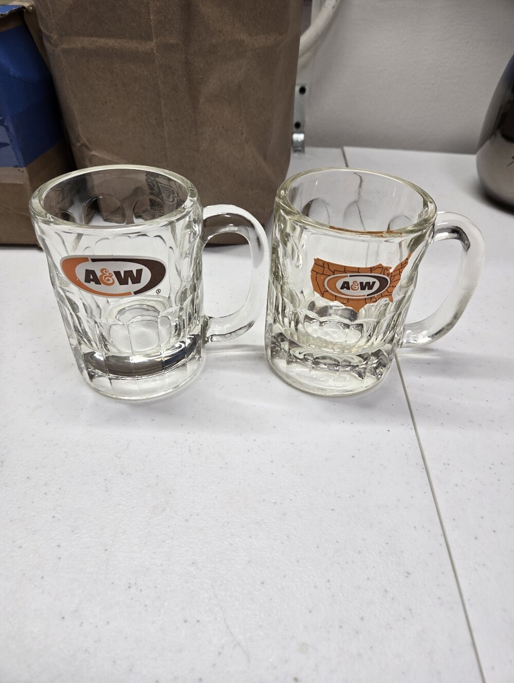 2 A&W Rootbeer Mugs 4 1/4" Tall. Excellent Condition. 2 Different Logos.
